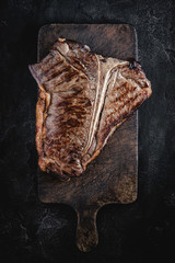 Grilled Dry Aged T-bone Steak on Vintage Cutting Board
