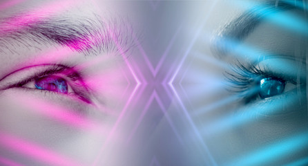 Eyes of a man and a female on a bright abstract background with holograms