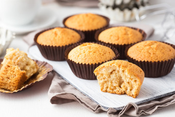 Vanilla cupcakes on a white board