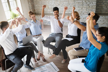 Fototapeta premium Happy success business team celebrating victory in office