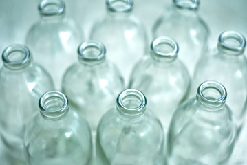 Group of empty reuse bottles glass.
