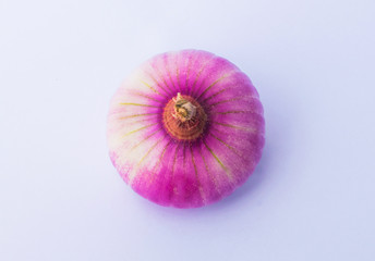 close up of fresh onion bulb on a white background