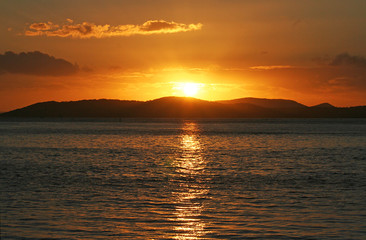 Sunset across the bay at Little beach. Australia.