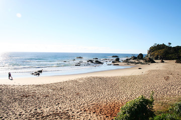 Fototapeta na wymiar A leisurely walk along Flynn's beach at Port Macquarie. Australia.