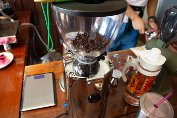 Coffee grinding machine in coffee shop