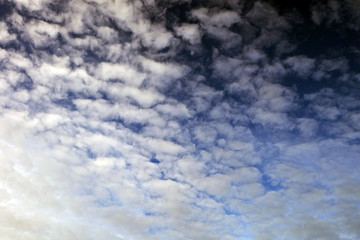 Fototapeta premium Sky clouds pattern. Cloud skies stormy in dark evening as landscape background. The most beautiful dramatic cloudy gray tone texture. Day concept.