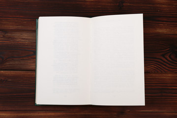 Old book wooden library desk, retro toned image, selective focus .