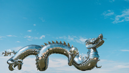 Flying dragon in the sky. Asian culture. The dragon hovers above the ground. Brilliant dragon.