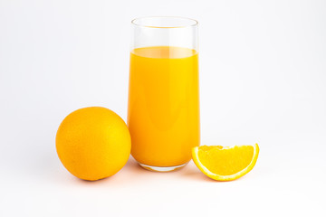 still life photo of orange juice, orange smoothie in glass on white background.