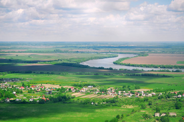 Obraz premium Panoramic bird's-eye view of the natural landscape: river, fields