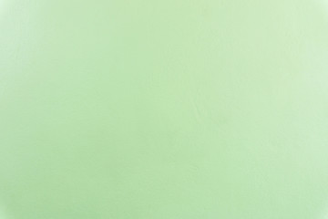Soft green painted concrete cement texture wall background