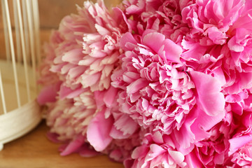 Bouquet of beautiful peony flowers on table, closeup