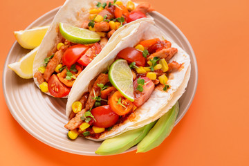 Plate with tasty tacos on color background