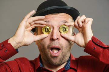 Man having bitcoin in eye