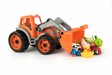 A small replica of an excavator. Isolated on a white background.