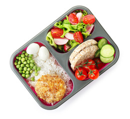 School lunch box with tasty food on white background