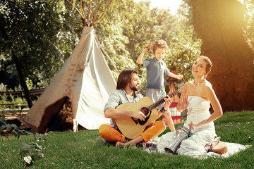 Joyful nice people playing their favourite music