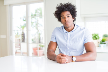 African American business man Relaxed with serious expression on face. Simple and natural looking at the camera.