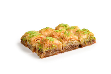 Pistachio baklava on a white background. Dessert.