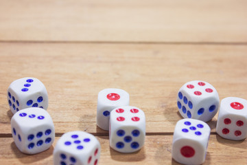 dice on wooden table.