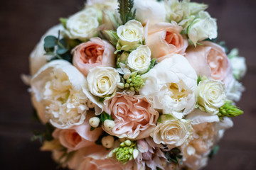 bouquet of flowers on a leg in the interior of the restaurant for the celebration of the flower shop wedding salon
