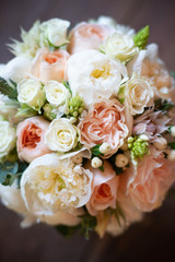 bouquet of flowers on a leg in the interior of the restaurant for the celebration of the flower shop wedding salon
