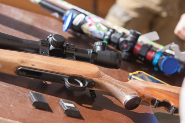 Modern rifle on a table