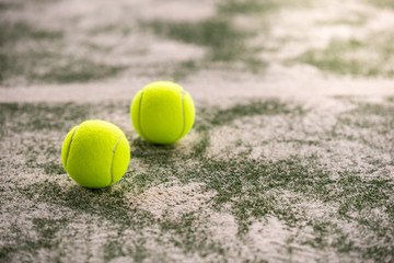 Tennis Balls on a Padel Court Indoors.