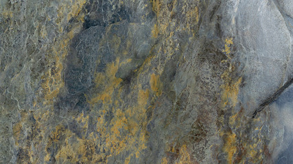 Rust stone wall natural pattern, bronze wall, lighting abstract texture background design layout..