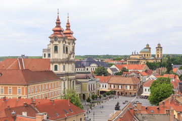 Eger, Hungary. View from castle walls towards old town and Istvan Dobo ter with Minorite Church and Cathedral Basilica in Background