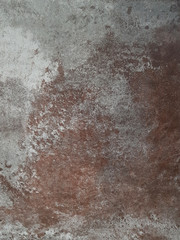 Texture of old dark gray plastered wall close up. Light texture of plaster. Moody background.
