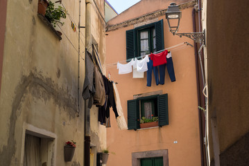 Fototapeta na wymiar Laundry drying outside in Sardinia Italy