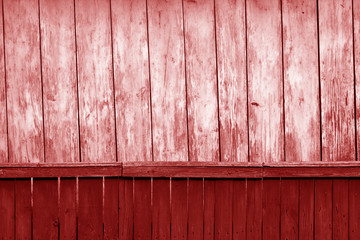 Old grunge wooden fence and wooden wall pattern in red tone.