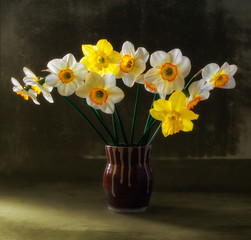 Still life with a bouquet of daffodils. Vintage. Retro.