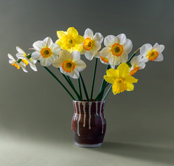 Still life with a bouquet of daffodils. Vintage. Retro.