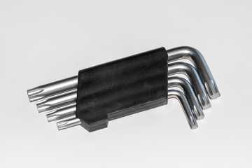 Set of double-ended torx hex keys of various sizes isolated on white