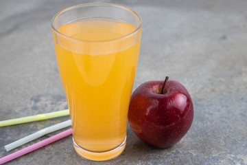 Healthy fresh apple juice in a glass.