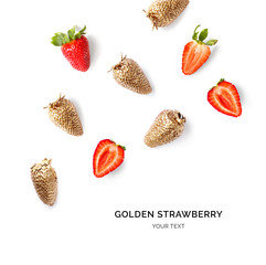 Creative layout made of gold strawberry.  Tropical flat lay. Food concept.
