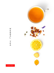 Creative layout made of cup of herbal tea, lemon, ginger on a white background. Top view.