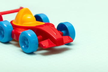 Children's toy plastic red machine, close up.