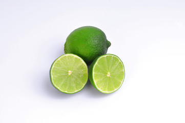 Lime lemons group on white background.