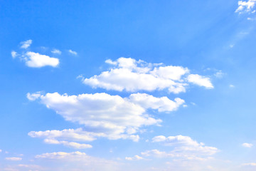 Naklejka na ściany i meble white clouds against blue sky