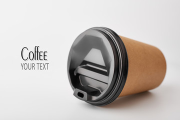Disposable coffee cup with lid. Coffee to go. Craft glass for coffee isolated on white background.
