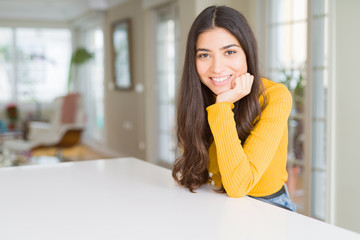 Beautiful brunette woman smiling cheerful with big smile, looking positive and happy