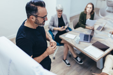 Professional giving presentation to his team