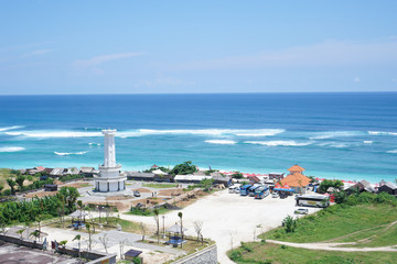sea and blue sky with houses on the beach top view