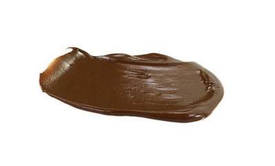 Melted hot chocolate. Drop isolated on white background. Hot melted chocolate pouring isolated on white background, with clipping path