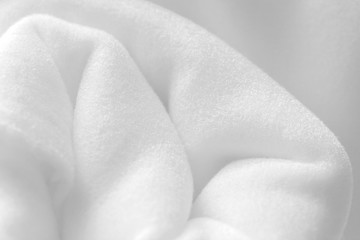 Background with white rolled fleece © evannovostro
