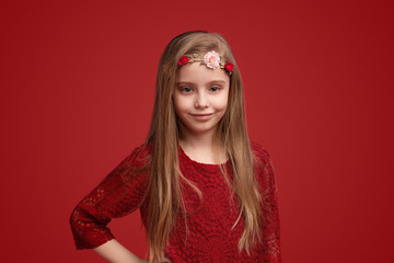 Smiling child in flower wreath