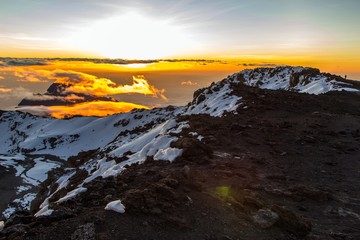 Meeting sunset on the roof of Africa. Kilimanjaro mountain, Uhuru peak 5895m